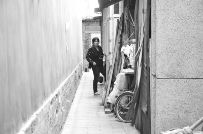 数十户居民长期生活在太庙院墙内。-图片版权归原作者所有